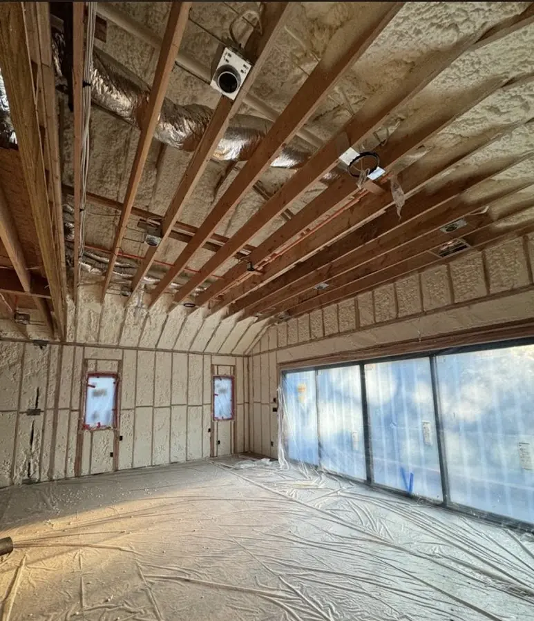 Interior walls and ceiling insulated with spray foam during new construction in Pasco
